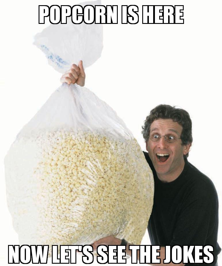 Big Bag of Popcorn Guy with the caption popcorn is here now let's see the jokes