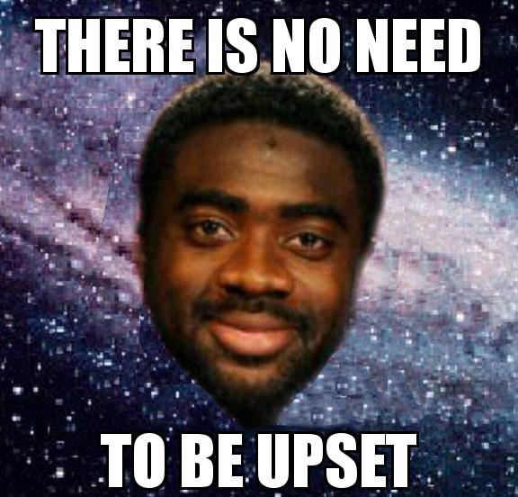 Kolo Toure Smiling Galaxy Background with the caption there is no need to be upset